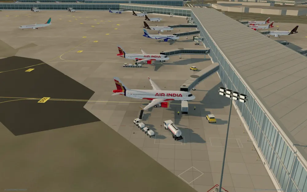 Aircraft on stand at Terminal 3 with bridges, baggage carts and a fuel truck